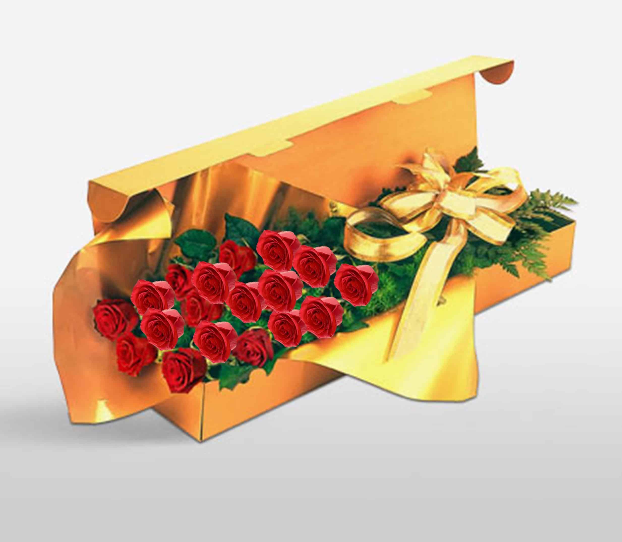 Red roses in a luxurious gold gift box with a ribbon, perfect for special occasions or romantic gestures.
